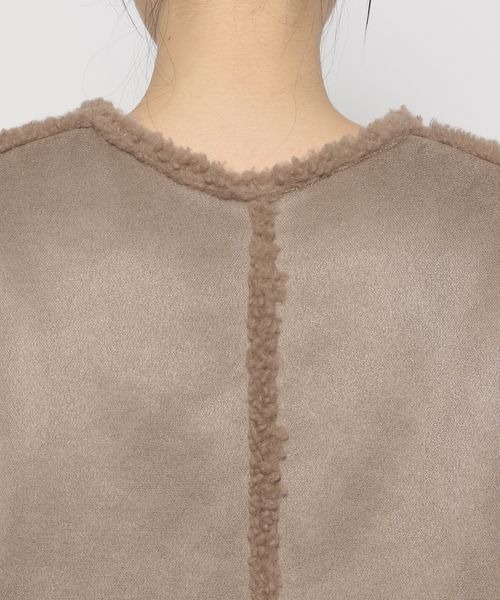 mysty woman（ミスティウーマン）の「ムートンリバーシブルベスト 180575（その他アウター・レディース・モカ/ホワイト系その他・FREE）」の5枚目の写真