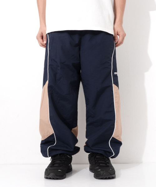 QT8 GARMENTS(キューティーエイトガーメント)の「LB Track Pants (Navy/Beige)(スウェットパンツ・レディース・その他・MEDIUM/LARGE/X-LARGE)」の1枚目の写真