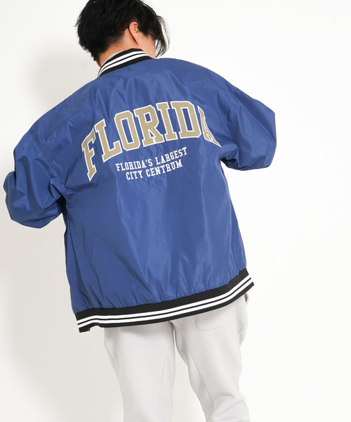 VENCEEXCHANGE(ヴァンスエクスチェンジ)の「カレッジロゴBIGシルエットスタジャン(スタジャン・メンズ・ブルー/ベージュ/グリーン・L/M)」の1枚目の写真