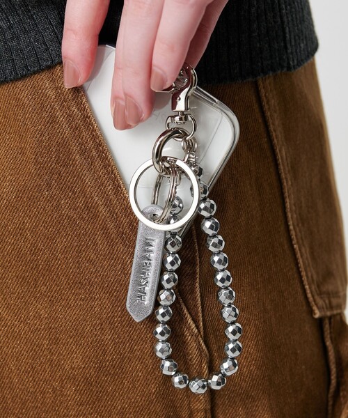 HASHIBAMI（ハシバミ）の「【別注】＜Hashibami＞カットボール ストラップ（スマホグッズ・レディース・ゴールド/シルバー・FREE）」の2枚目の写真