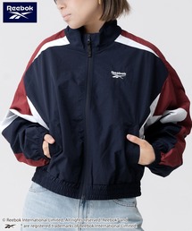 Reebok(リーボック)の【別注】Reebok/リーボック ブランド ロゴ ワンポイント 配色切替 フルジップ クロップド ナイロン トラックジャケット(ナイロンジャケット)