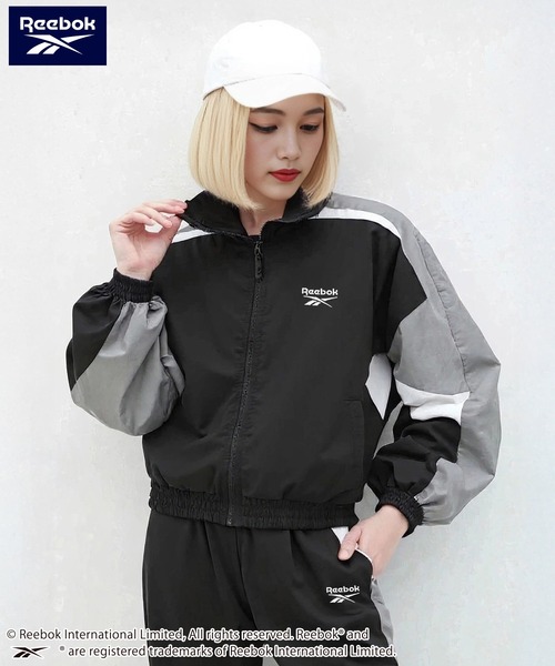 Reebok(リーボック)の「【別注】Reebok/リーボック ブランド ロゴ ワンポイント 配色切替 フルジップ クロップド ナイロン トラックジャケット(ナイロンジャケット・レディース・ネイビー/ブラック・M/L)」の22枚目の写真