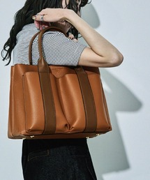 D.KELLY（ディーケリー）の「D.KELLY モダンバイカラーアウトポケット2WAYトートバッグ レディース バッグ（トートバッグ）」