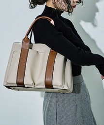 D.KELLY（ディーケリー）の「D.KELLY モダンバイカラーアウトポケット2WAYトートバッグ レディース バッグ（トートバッグ）」