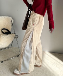 Java（ジャバ）の「《Javaジャバコラボ》スポーティー＆スタイリッシュ。サイドジップ配色シャカシャカパンツ（その他パンツ）」