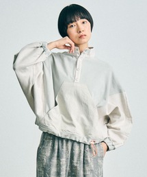 sneeuw（スニュウ）の「ハーフスナッププルオーバー（ブルゾン）」