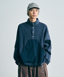 sneeuw（スニュウ）の「ハーフスナッププルオーバー（ブルゾン）」