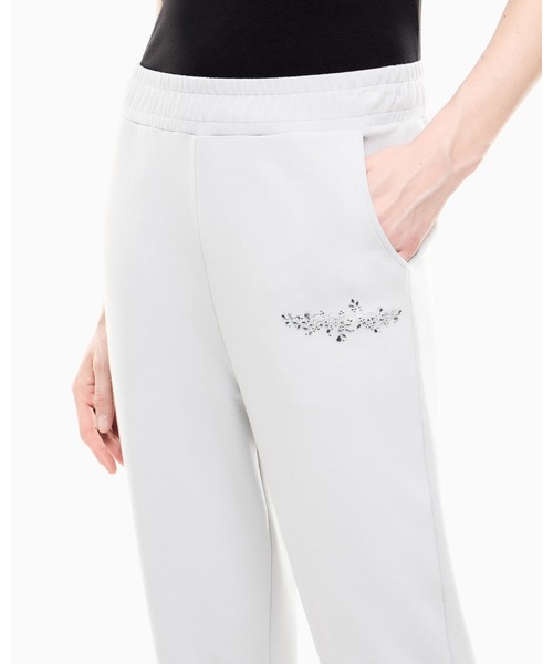 EMPORIO ARMANI EA7(エンポリオアルマーニイーエーセブン)の「<オンライン限定>【エンポリオ アルマーニ EA7】ウィメンズ クリスタル装飾 ジョガーパンツ Logo Series(その他パンツ・レディース・ライトグレー・MEDIUM/LARGE/SMALL)」の4枚目の写真