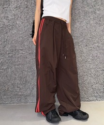 LYEON | サイドラインナイロントラックパンツ(その他パンツ)
