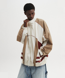 DNSR（ディーエヌエスアール）の「ナイロン トラック ジップアップジャケット ベージュ（ナイロンジャケット）」