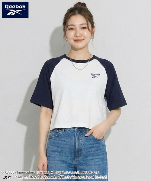 Reebok(リーボック)の「【karlas別注】Reebok リーボック クロップド ラグランTシャツ UVカット 接触冷感 半袖Tシャツ(Tシャツ/カットソー・レディース・ホワイト×ブラック/ブラック/ホワイト×ネイビー・M/L/LL)」の1枚目の写真