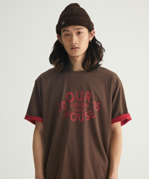A'GEM9(エージェムナイン)の「A'GEM/9 × .kom『WASSUP/ワズアップ』Our House Tee/アワーハウス リバーシブルカラー グラフィック 半袖 Tシャツ(Tシャツ/カットソー・メンズ・ブルー/ブラウン・L/XL)」の3枚目の写真