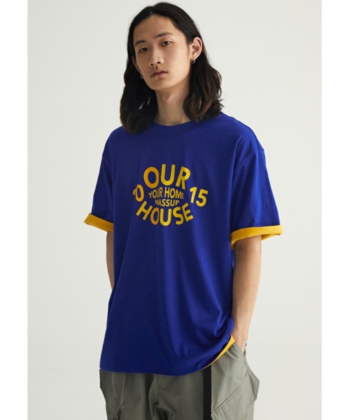 A'GEM9(エージェムナイン)の「A'GEM/9 × .kom『WASSUP/ワズアップ』Our House Tee/アワーハウス リバーシブルカラー グラフィック 半袖 Tシャツ(Tシャツ/カットソー・メンズ・ブルー/ブラウン・L/XL)」の8枚目の写真