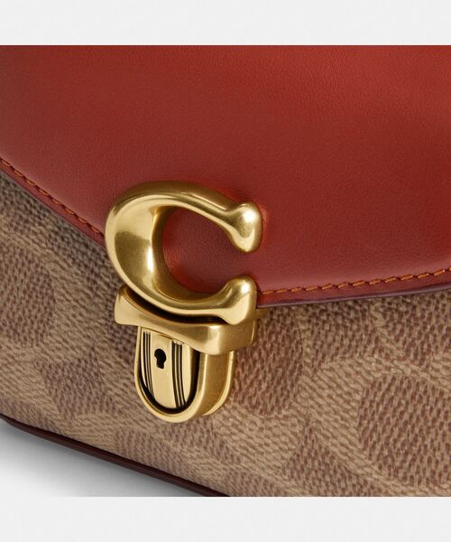 COACH（コーチ）の「サミー トップ ハンドル 12・シグネチャー