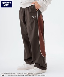 Reebok | Reebok/リーボック ブランド ロゴ ワンポイント 切替 パイピング 裏メッシュ ナイロン トラックパンツ ロングパンツ(その他パンツ)