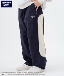 Reebok | Reebok/リーボック ブランド ロゴ ワンポイント 切替 パイピング 裏メッシュ ナイロン トラックパンツ ロングパンツ(その他パンツ)