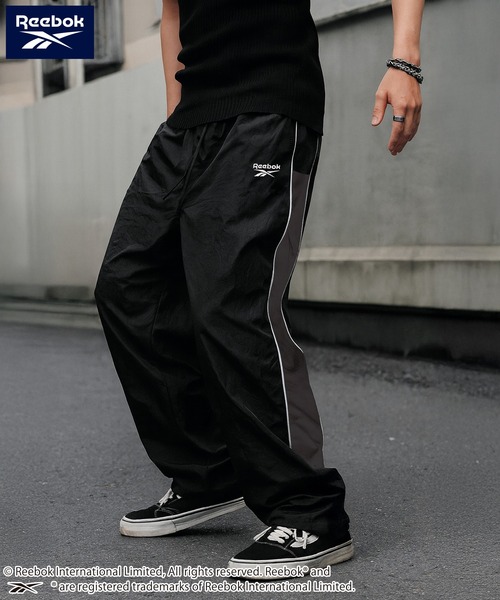 Reebok（リーボック）の「Reebok/リーボック ブランド ロゴ ワンポイント 切替 パイピング 裏メッシュ ナイロン トラックパンツ ロングパンツ（その他パンツ・メンズ・グリーン/ブラック/ダークブラウン/ネイビー・L/M/LL）」の2枚目の写真