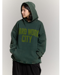 PHILIPPAKER（フィリップペイカー）の「ビエムシーエイチダブルユーシーフードパーカー ピグメントヴィンテージグリーン（パーカー）」