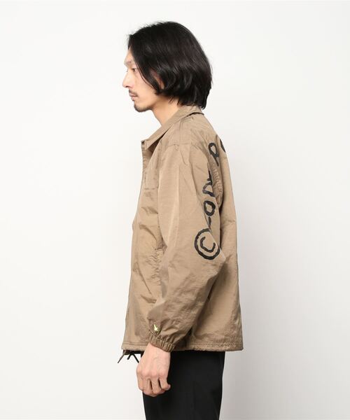 Mark Gonzales(マーク・ゴンザレス)の「ワッシャーナイロン プリント コーチジャケット(ナイロンジャケット・メンズ・ブラック/ベージュ/カーキ・M/L/XL)」の7枚目の写真