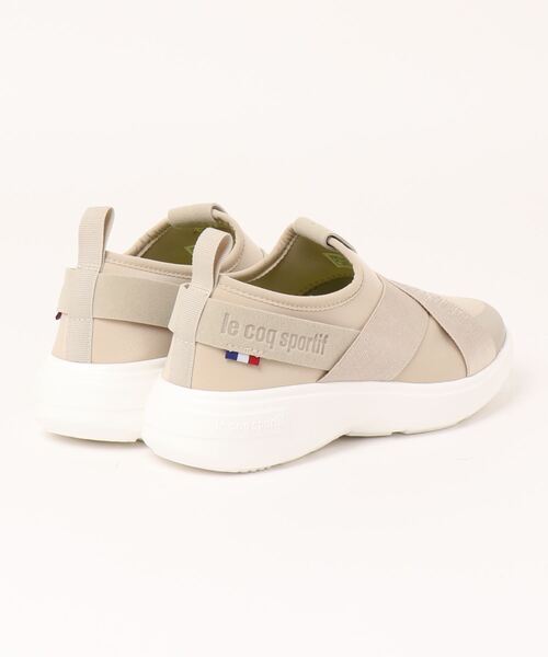 le coq sportif(ルコックスポルティフ)の「クロスベルトスリッポンスニーカー(ラ ローヌ DBSP)(スリッポン・レディース・ベージュ/ブラック/グレー/ブラック×ブラック・24cm/25cm/24.5cm/23cm/22.5cm/23.5cm)」の17枚目の写真