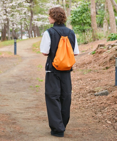 WETTEMPT(ウィテンプト)の「BICOLOR KNAPSACK / バイカラーナップサック(バックパック/リュック・メンズ・オレンジ/ブラック・ONE SIZE)」の11枚目の写真