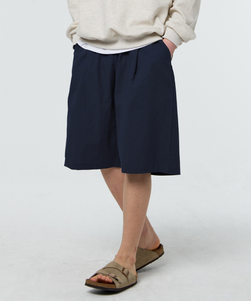 PAPERBOY(ペーパーボーイ)の「リネンバイオピンタックハーフパンツ-ネイビー(その他パンツ・レディース・その他・SMALL/MEDIUM/LARGE/X-LARGE)」の1枚目の写真