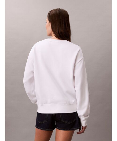 Calvin Klein(カルバン・クライン)の「スウェット - Heritage Classic レギュラーグラフィッククルーネックトレーナー(スウェット・レディース・ホワイト・XS/S)」の3枚目の写真