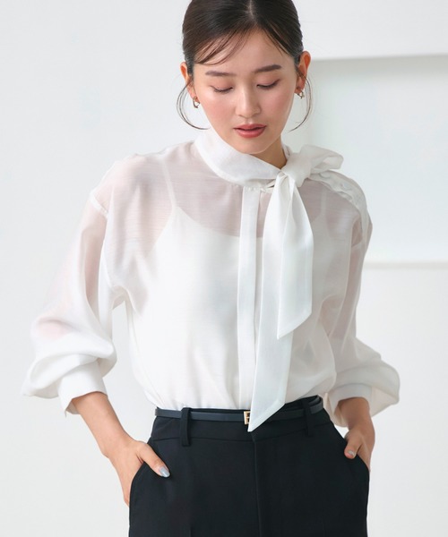 RUIRUE BOUTIQUE(ルイルエブティック)の「洗える | アシンメトリー ボウタイ シアー ブラウス | 長袖 シアーブラウス トップス シャツ ボウタイブラウス(シャツ/ブラウス・レディース・ブルー/ブラック/ホワイト・S/M/L/LL)」の1枚目の写真