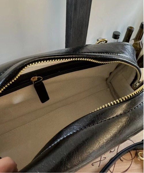NiiNa(ニーナ)の「【NiiNa】【高品質牛革】2wayヴィンテージレトロボストンバッグ(ボストンバッグ・レディース・ホワイト・FREE)」の7枚目の写真