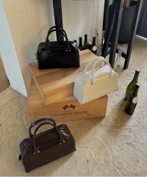 NiiNa(ニーナ)の「【NiiNa】【高品質牛革】2wayヴィンテージレトロボストンバッグ(ボストンバッグ・レディース・ホワイト・FREE)」の16枚目の写真
