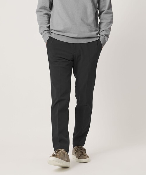 UNITED ARROWS(ユナイテッドアローズ)の「SPORTEX ノープリーツ テーパードパンツ UA COZY ウォッシャブル 2WAYストレッチ 撥水(スラックス・メンズ・ブラック・L/XL/M)」の1枚目の写真