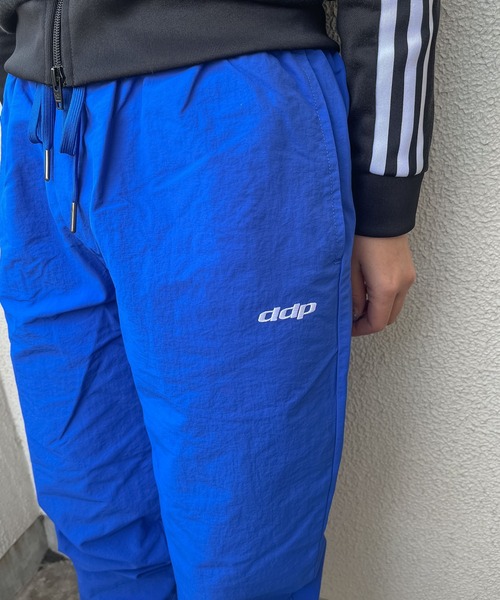 ddp（ディーディーピー）の「【 ddp / ディーディーピー 】 ナイロントレーニングパンツ NYLON TRANING PANTS A5306-153AA02 MNF（その他パンツ・レディース・グレー/ネイビー/ブルー・MEDIUM/LARGE）」の11枚目の写真