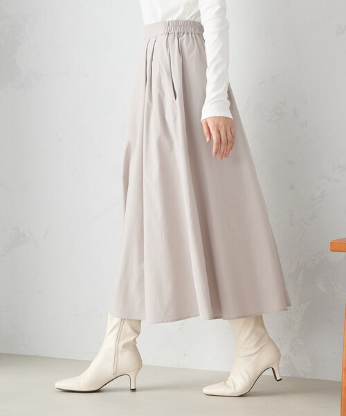 COMME CA ISM（コムサイズム）の「タックフレアー　タフタスカート（スカート・レディース・ネイビー/グレイッシュベージュ・MEDIUM/LARGE）」の6枚目の写真