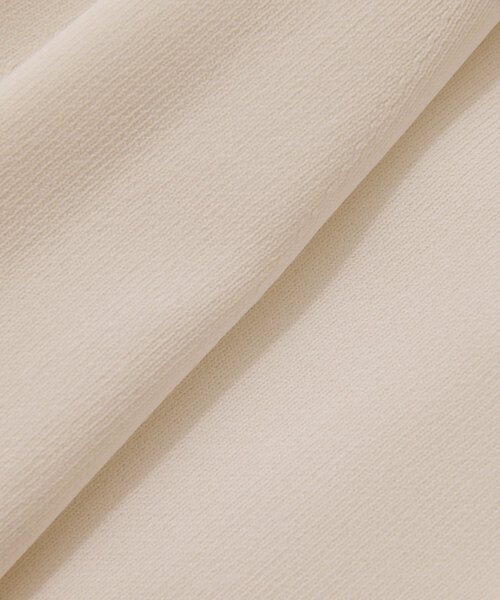 Whim Gazette(ウィムガゼット)の「ペプラムプルオーバー(ニット/セーター・レディース・オフホワイト/ベビーピンク/ネイビー・FREE)」の4枚目の写真