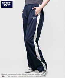 Karlas（カルラス）の「【別注】Reebok/リーボック シャドーストライプジャージ ジャージパンツ トラックパンツ（その他パンツ）」
