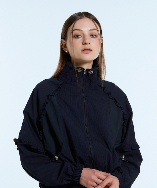 LARTIGENT(ラーティゼン)の「L11 FRILL WINDBREAKER(NAVY)(ナイロンジャケット・レディース・その他・FREE)」の2枚目の写真