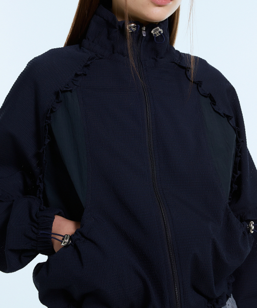 LARTIGENT(ラーティゼン)の「L11 FRILL WINDBREAKER(NAVY)(ナイロンジャケット・レディース・その他・FREE)」の4枚目の写真