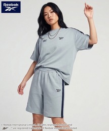Reebok（リーボック）の「Reebok リーボック 上下セット セットアップ 薄手ミニ裏毛 半袖Tシャツ+ハーフパンツ（セットアップ）」