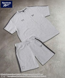 Reebok（リーボック）の「Reebok リーボック 上下セット  オーバーサイズセットアップ ミニ裏毛 半袖Tシャツ ハーフパンツ（セットアップ）」