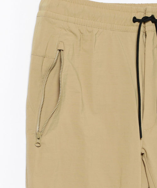 NIKE（ナイキ）の「NIKE / ウーブン スポーツウェア パンツ（その他パンツ・メンズ・ブラック/ベージュ・SMALL/MEDIUM/LARGE）」の11枚目の写真