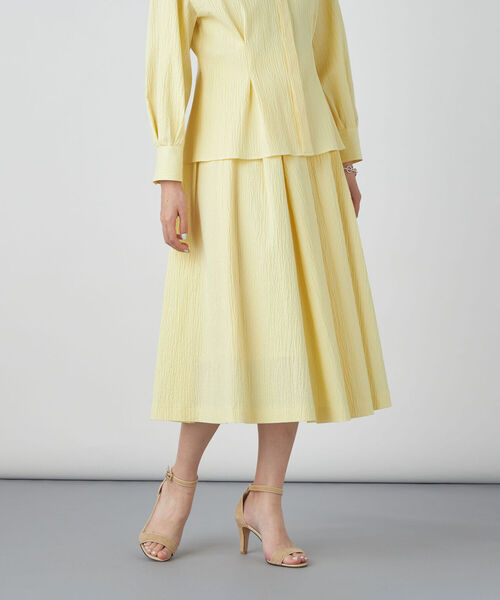 NOLLEY’S Sophi（ノーリーズソフィ）の「リップルタックフレアースカート（スカート・レディース・ホワイト/イエロー/サックスブルー・36/38/34）」の3枚目の写真