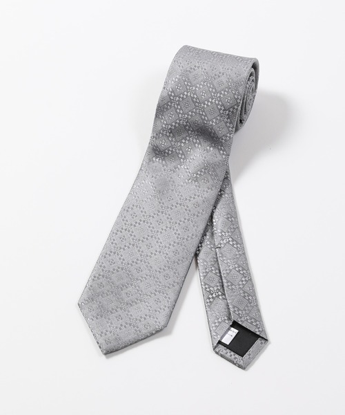 MEN'S BIGI(メンズビギ)の「【TIE YOUR TIE(タイユアタイ)】ジオメトリック柄シルクネクタイ(ネクタイ・メンズ・シルバー/ターコイズブルー・FREE)」の2枚目の写真