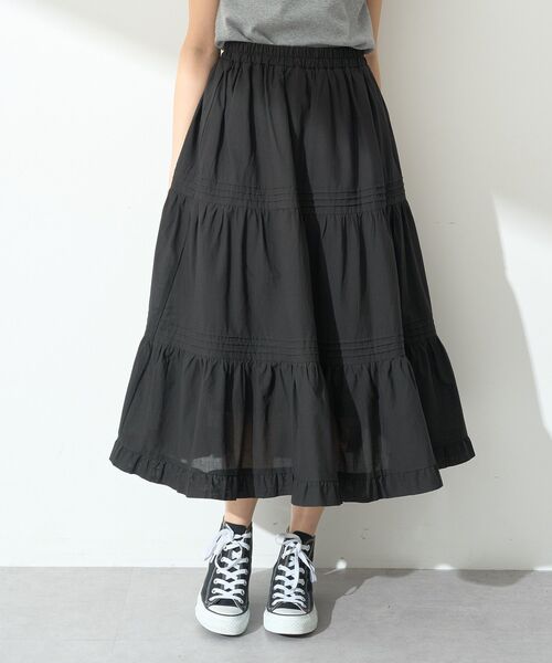 earth music&ecology(アースミュージックアンドエコロジー)の「ピンタックティアードミディスカート(スカート・レディース・アイボリー/ブラック・FREE)」の1枚目の写真