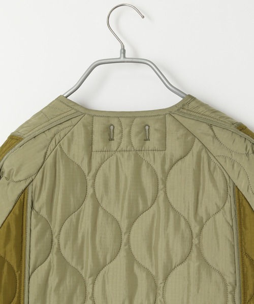 yuw（ユウ）の「リバーシブルバイカラーキルティングコート　970751（ナイロンジャケット・レディース・カーキ/ネイビー・FREE）」の7枚目の写真