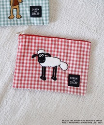 ACCOMMODE（アコモデ）の「【ひつじのショーン】チェックポーチ（ポーチ）」