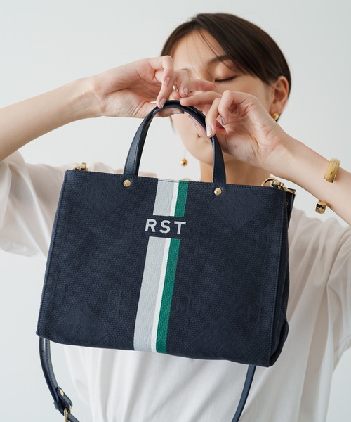 美品 ラシット russet 総柄ボディーバッグ レディース ネイビー russet ラシット 百合紋章 ボディバッグ ナイロン素材 レディース 中古