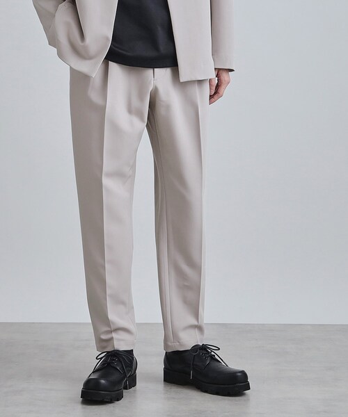 tk.TAKEO KIKUCHI(ティーケータケオキクチ)の「【セットアップ対応】360度ストレッチ ワイドテーパードパンツ(その他パンツ・メンズ・ブルー/ライトグレー/ブラック・01/02/03/04)」の1枚目の写真