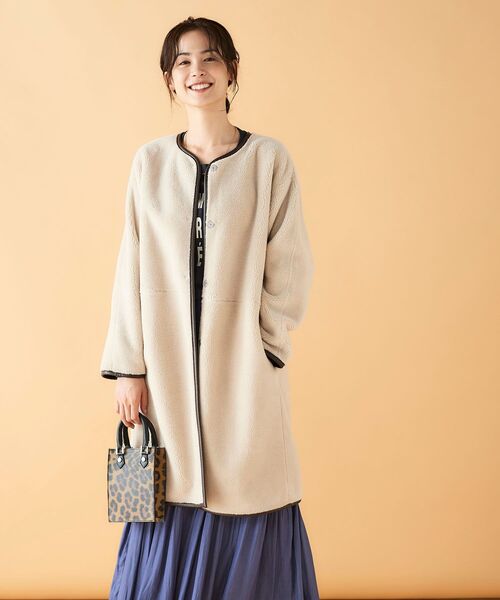 le.coeur blanc（ルクールブラン）の「リバーシブルフェイクムートンコート（ムートンコート・レディース・アイボリー/キャメル・38/36）」の2枚目の写真