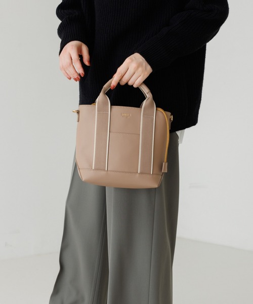 LOWELL things(ロウェル シングス)の「●ドット巾着付2WAYミニトートBAG(トートバッグ・レディース・ブラック/ベージュ/パープル・フリー)」の3枚目の写真