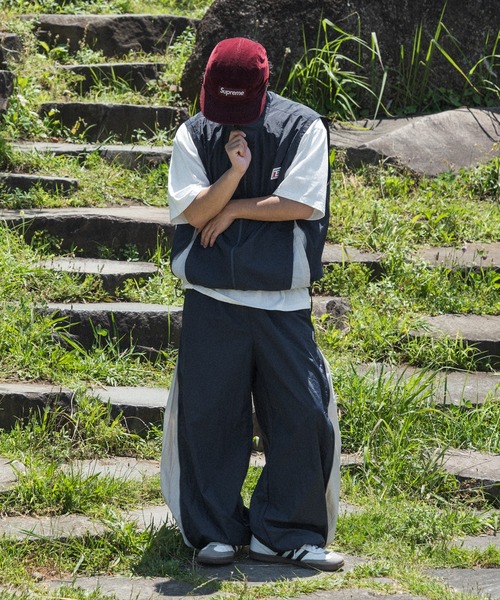 kutir(クティール)の「【低身長だからカッコよく着こなせるアイテム】バイカラージップナイロンベスト(セットアップ着用可能)(ベスト・メンズ・ネイビー/アイボリー/ブラック・SMALL/MEDIUM)」の5枚目の写真